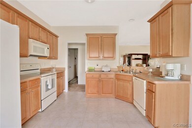 Great open kitchen with tile floors, classic light