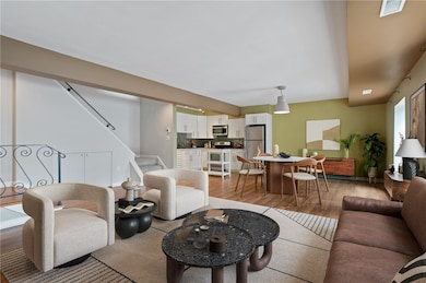 The first floor level of this two story condo feat
