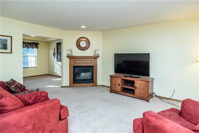 16x13 Living room with gas corner fireplace!