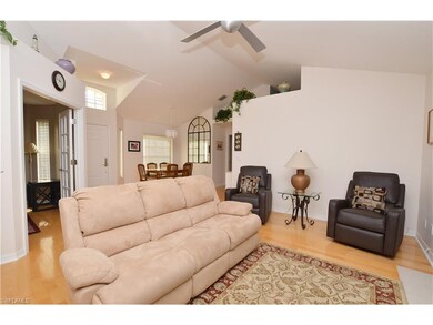 LIVING ROOM /ENTRY GORGEOUS WOOD FLOORS AND CATHED