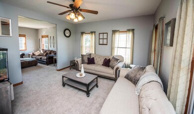 Light and bright living room with adjoining family