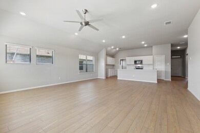 Living Room in the Diamond home plan by Trophy Signature Homes – REPRESENTATIVE PHOTO