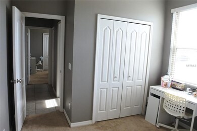 Bedroom 1 Closet / View into Bedroom 2 and Bathroo