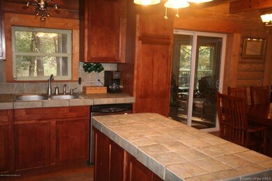 06 Kitchen & screened porch