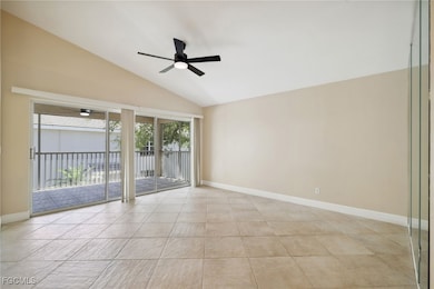 Living room, view out to the screened patio.