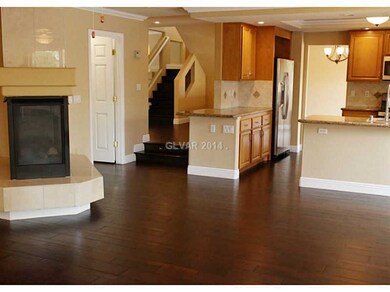 Property Photo. FAMILY ROOM LOOKING TOWARDS STAIRW
