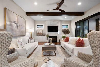 Stylish touches everywhere including the marbled fireplace.