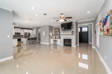 Enter a sunlit living area where marble flooring s