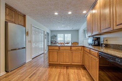 View of the roomy eat-in kitchen, with large pantry.