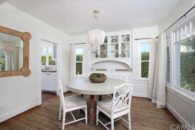 Dinning room with built-ins and hardwood floors. L