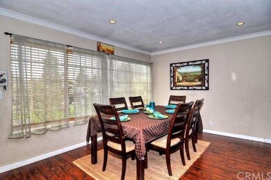 Spacious Formal Dining Room with loads of light.