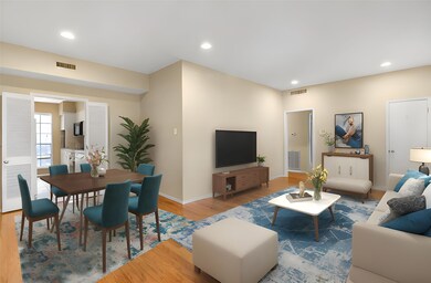 Virtual Staging -  Living room featuring wood finished floors and recessed lighting