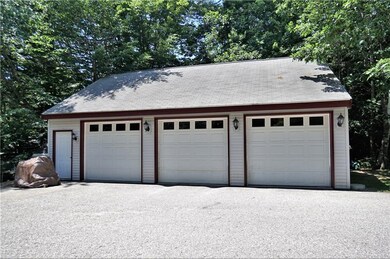 Oversized 3 car garage has a room...