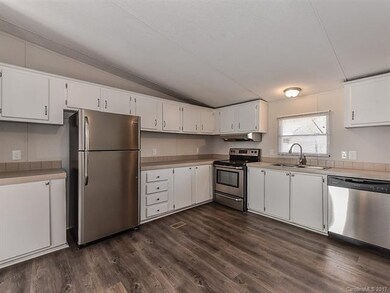All New Flooring, Refreshed Cabinetry, New Counter