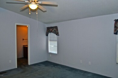 MASTER BEDROOM W/VAULTED CEILING