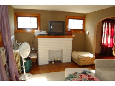 Living Room. Cozy artificial fireplace. Hardwood f