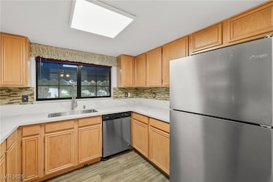Kitchen featuring appliances with stainless steel