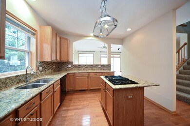 Spacious Kitchen with center Island and granite co