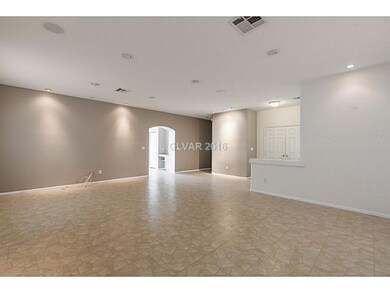 Living Room. BEAUTIFUL ARCHED ENTRYWAY INTO KITCHE
