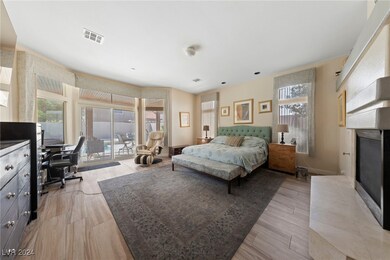 Huge primary bedroom, this one located downstairs.