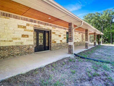 Large porch with view of the pond.