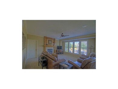 Expanded Great Room with plantation shutters
