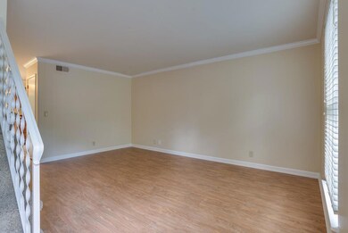 Spacious living area with cable connections and new flooring