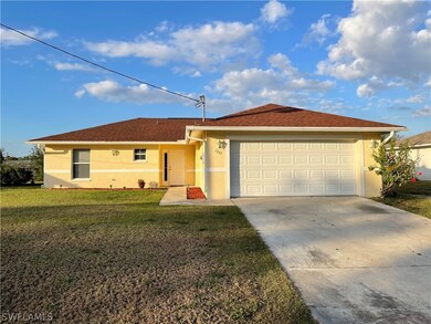 1247 Ellipse St E, Lehigh Acres, FL 33974 - photo 2