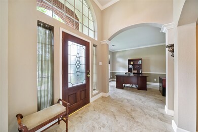 Flexible space at entry is perfect for a study or formal living area.