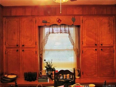 Dining area  has even more built in cabinet space!