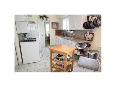 UPDATED EAT IN KITCHEN WITH GRANITE COUNTERTOPS AN