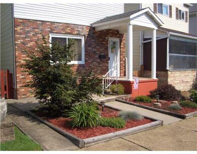 Exterior Front. Colorful landscaping which adds to