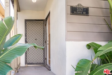 front door to detached studio unit in the front