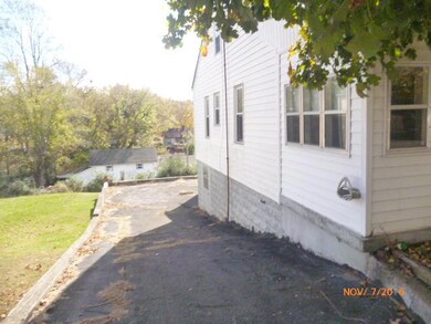 Left side of home, driveway