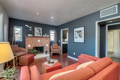 Living Room w/ Wood Burning Fireplace
