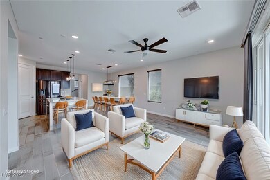 Living room featuring recessed lighting, visible v