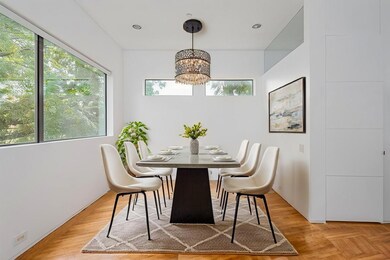 Dining space with recessed lighting, parquet floor