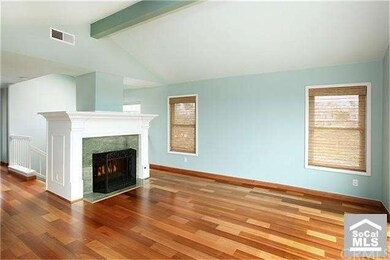 Pano Coastal Views, hardwood floors,a custom firep