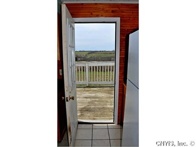 Patio/Deck. View directly from kitchen to the suns