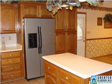 stainless refrigerator...pantry to the right of re