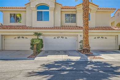 View of front of property featuring a tiled roof,
