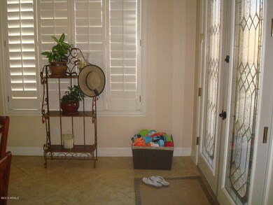 French doors exit to pool