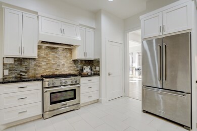 The kitchen features Kitchenaid stainless steel ap