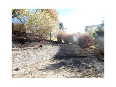 Other. View of Stone Patio and Versa Lok wall/