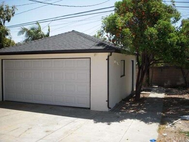 Detached garage with new doors awaits you. 