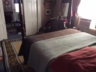 912 Bedroom with Pocket Doors leading into Living