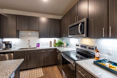 Kitchen - not actual unit, photos are of furnished