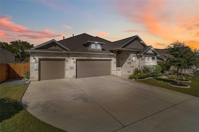 Craftsman inspired home with stone siding, concrete driveway, roof with shingles, and a garage