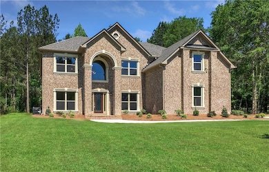 View of front of property featuring brick siding a