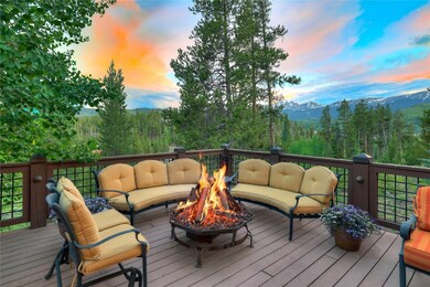 Wooden terrace with an outdoor living space with a